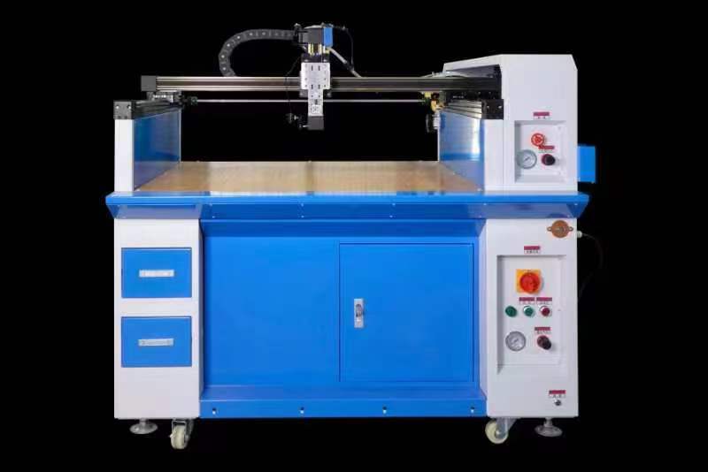 آلة توزيع الغراء